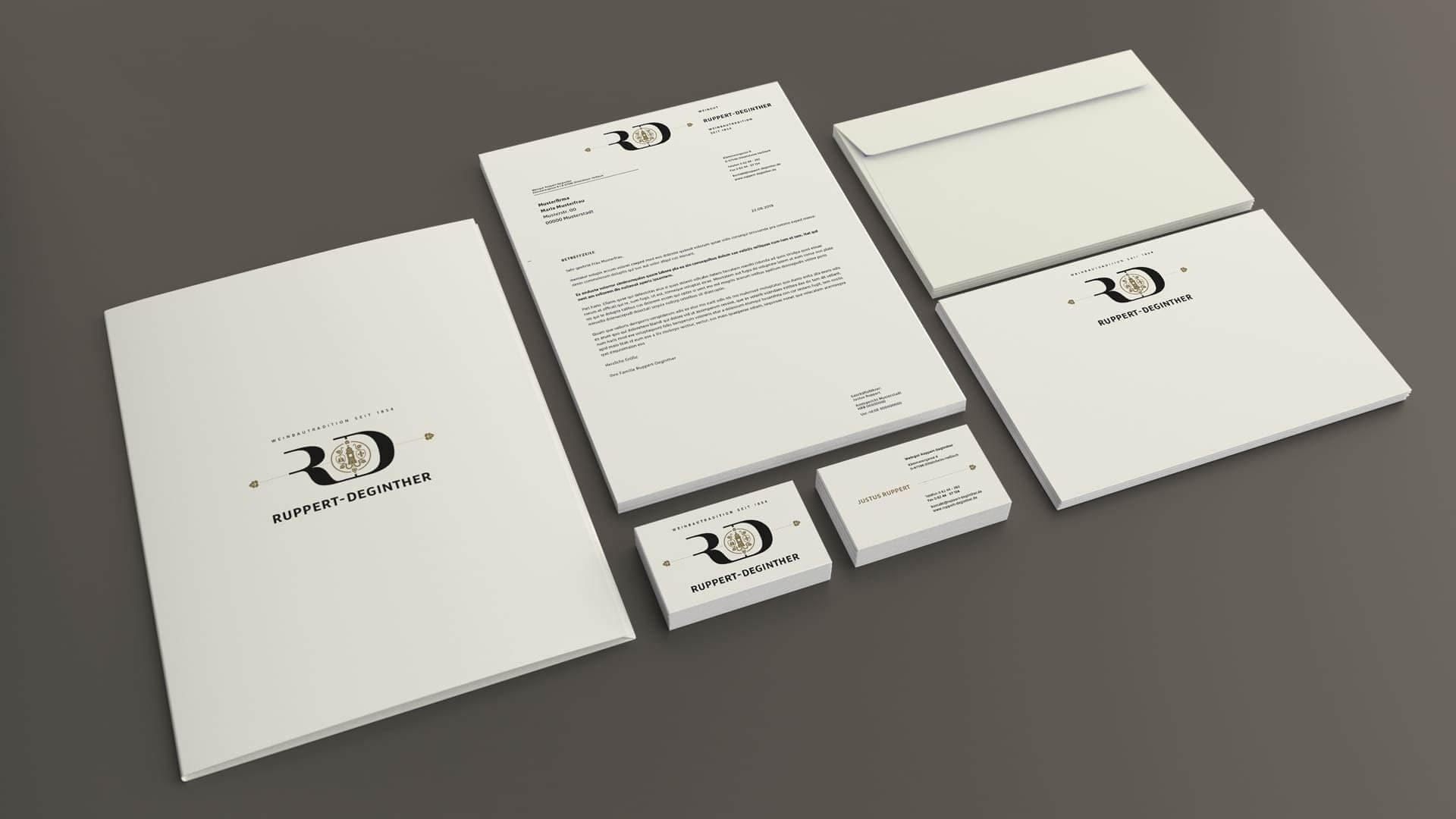 Corporate Identity Design für Ruppert-Deginther | Ein ausgezeichnetes Weingut in Rheinhessen | Darstellung der Geschäftsausstattung (Mappe, Briefpapier, Visitenkarten, Kuverts)